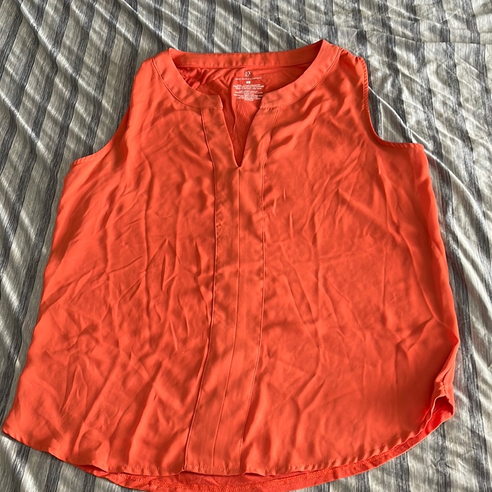 Orange sleeveless blouse